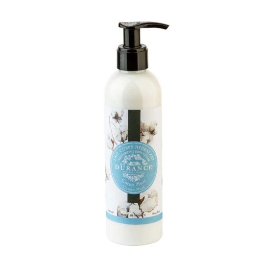 Durance cotton must body lotion in plastic bottle with white blue and black label and black pump against white background